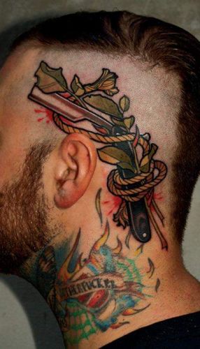 Friseur-Motherfucker-Tattoo