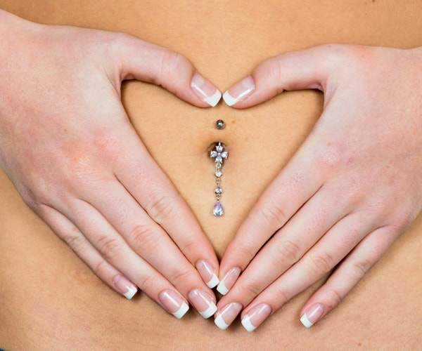 piercing-belly-385657963